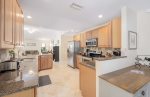 Open Kitchen with Stainless Steel Appliances